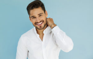 Portrait of sexy smiling male model