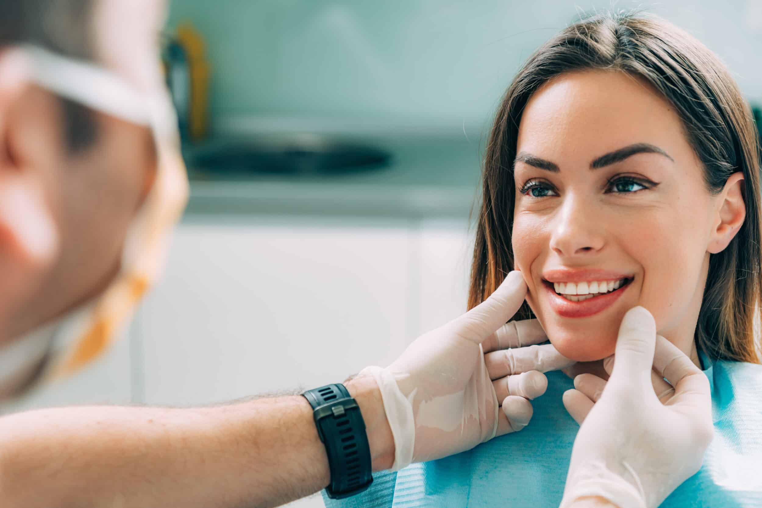 A woman smiling after laser dentistry in Suffolk County, NY