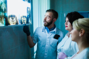 dentists looking at x-rays